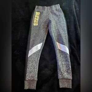 Grey blesses swats, comes with pockets.